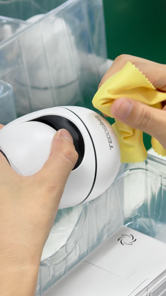 ANHONG operator cleaning and checking a camera unit